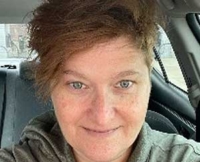 STACY AMIDON